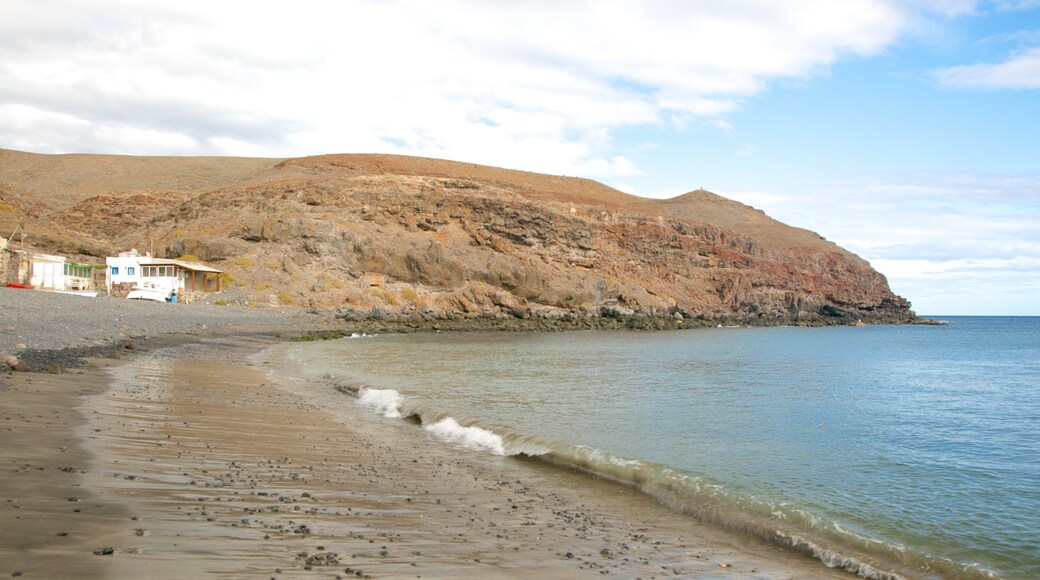 Playa Barca which includes rocky coastline