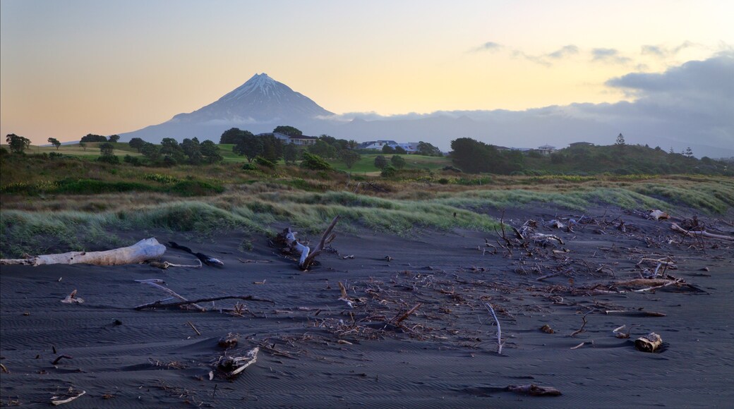 Taranaki which includes a sunset, tranquil scenes and mountains