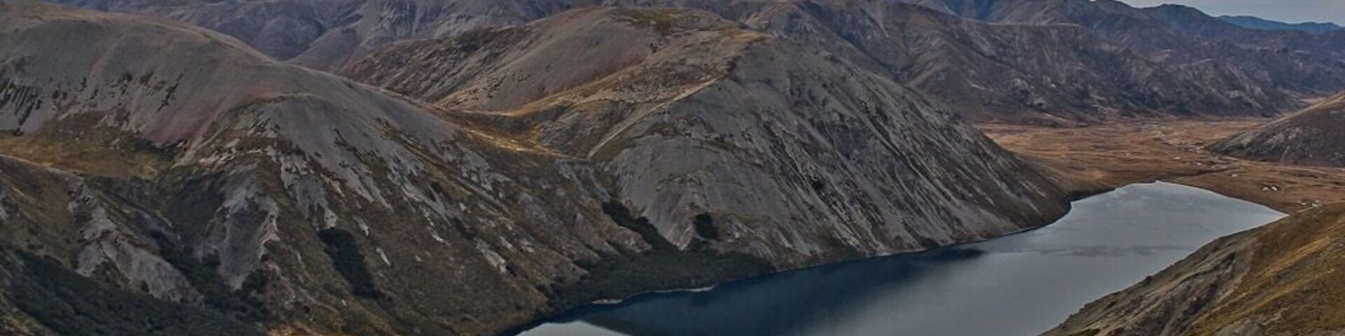 Lake Tennyson is a beautiful, off the beaten track destination in Canterbury, New Zealand. You can camp at the southern end of the lake and drive in from St Arnaud in Nelson Lakes National Park (to the north) or from Hanmer Springs to the south. If you have lots of cash, you can hire a helicopter (I was on a work trip when I got to go on one around the area)!