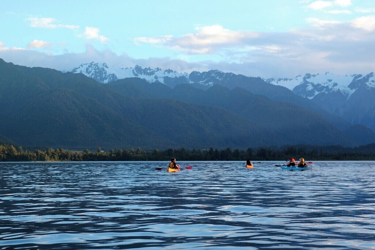 On the west coast of New Zealand's South Island is Lake Mapourika, next to the stunning Franz Josef Glacier. Normally calm and as still as a mirror, if the weather is shining you can usually see the year-round glaciers across the lake. One of the best ways to experience it is at sunset by kayak with Glacier County Kayaks