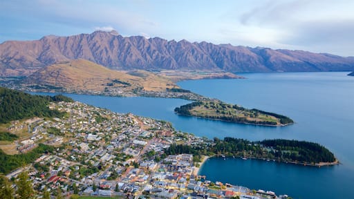 Otago showing mountains, a small town or village and a lake or waterhole