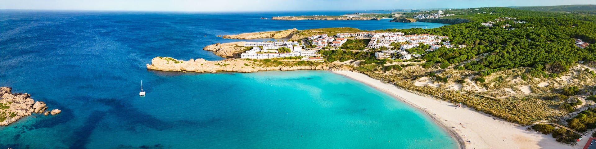 Areal drone view of Arenal de Son Saura beach at Menorca island, Spain