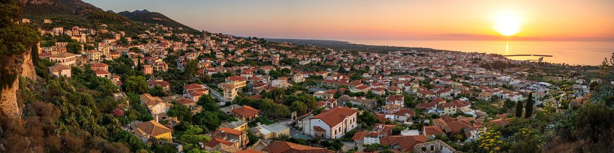 Beautiful sunset view by the historical castle of Kyparissia coastal town at sunset. Located in northwestern Messenia, Peloponnese, Greece, Europe.