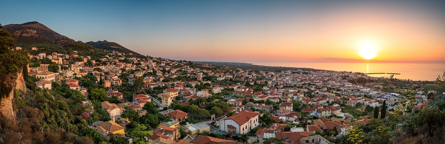 Beautiful sunset view by the historical castle of Kyparissia coastal town at sunset. Located in northwestern Messenia, Peloponnese, Greece, Europe.