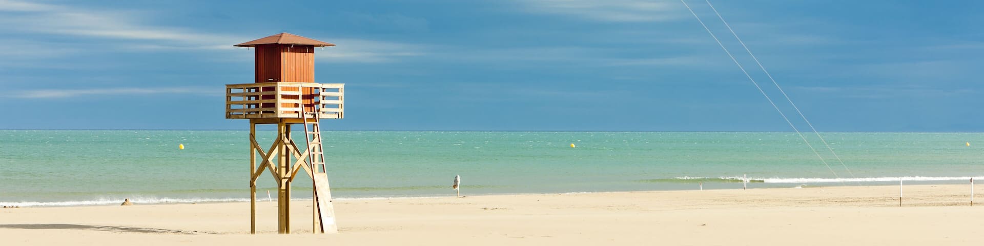 lifeguard cabin on the beach in Narbonne Plage, Languedoc-Roussillon, France, Shutterstock ID 155957708, Purchase Order: SP-1394 HA Batch 3 Part 1, Order Number: , Client/Licensee: HomeAway, Other: To