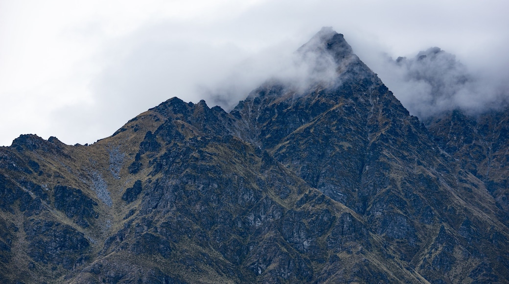 Lake Wakatipu which includes mountains and mist or fog