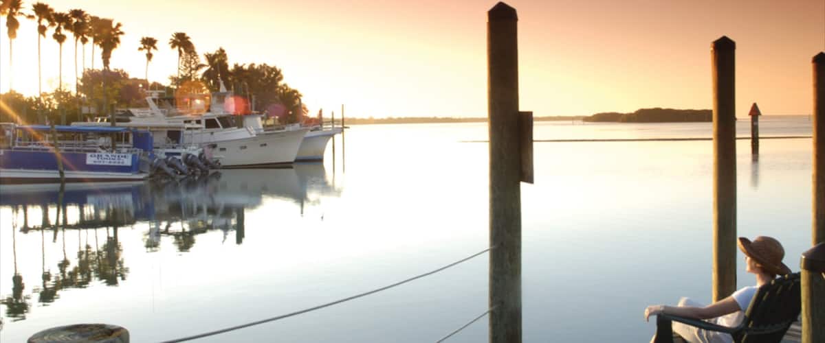 Port Charlotte - Charlotte Harbor que inclui paisagens litorâneas e um pôr do sol