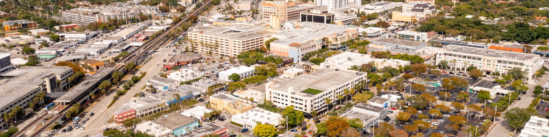 South Miami sunset Place facing towards downtown district shot with aerial drone