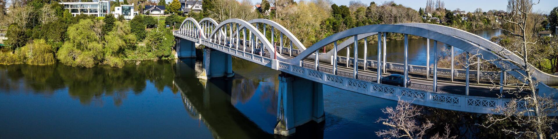 Aerial panoramic view looking West to the Fairfield Bridge over the Waikato River in Hamilton, New Zealand.