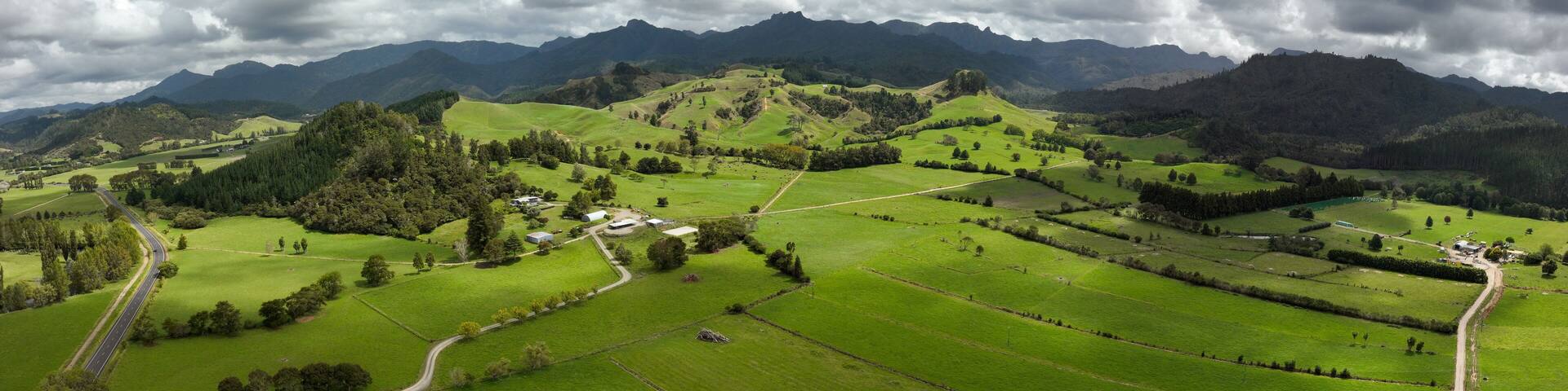 Waikato Region aerial view on a cloudy summer day. Countryside of New Zealand