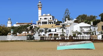 Panoramic of the new and old lighthouse of El Rompido, Cartaya, Costa de la Luz, Huelva region, Andalucia, Spain, Europe, made from the beach,