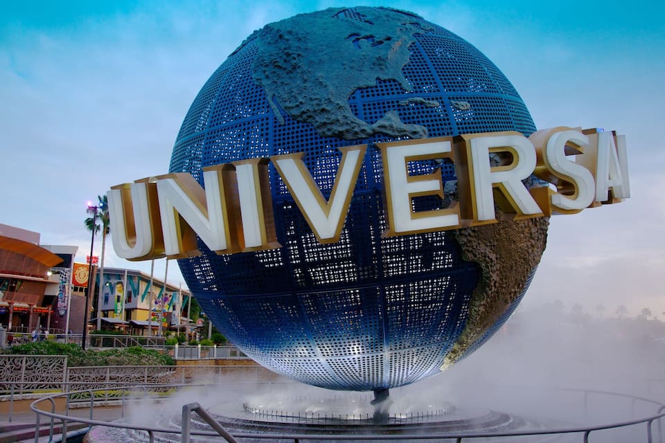 A large blue globe with the word "UNIVERSAL" in gold letters.