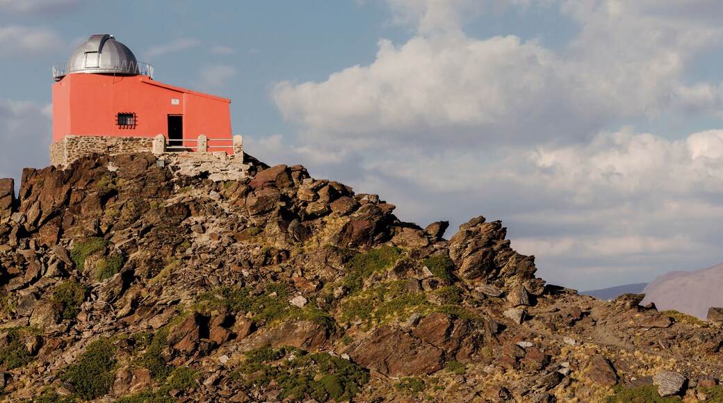 The observatorio Mohon del Trigo is an observatory, which was built in in 1902 and contained a 32 cm Cassegrain type KYOTO reflector telescope donated by Georgetown University. It is located in the vicinity of Pico del Veleta (3394m) in the Sierra Nevada mountain range in Spain at a height of about 2600m. The observatory was abandoned in the 1970s and deterioated into a ruin as documented by me in 2010. Since then, the observatory has been restored and is today in good shape (as seen from the outside, at least, I have not been inside). Nearby is also barracks used by the Special Operations Command of Spain. Here, the observatory is seen in evening sun as viewed from nearby Monument of Our Lady of the Snows. From this view point, the modern Sierra Nevada Observatory established 1981 can also be seen, but in the opposite direction.(Thanks to Slaunger for his excellent caption of his Featured Picture of the same building, I've almost copied and pasted...