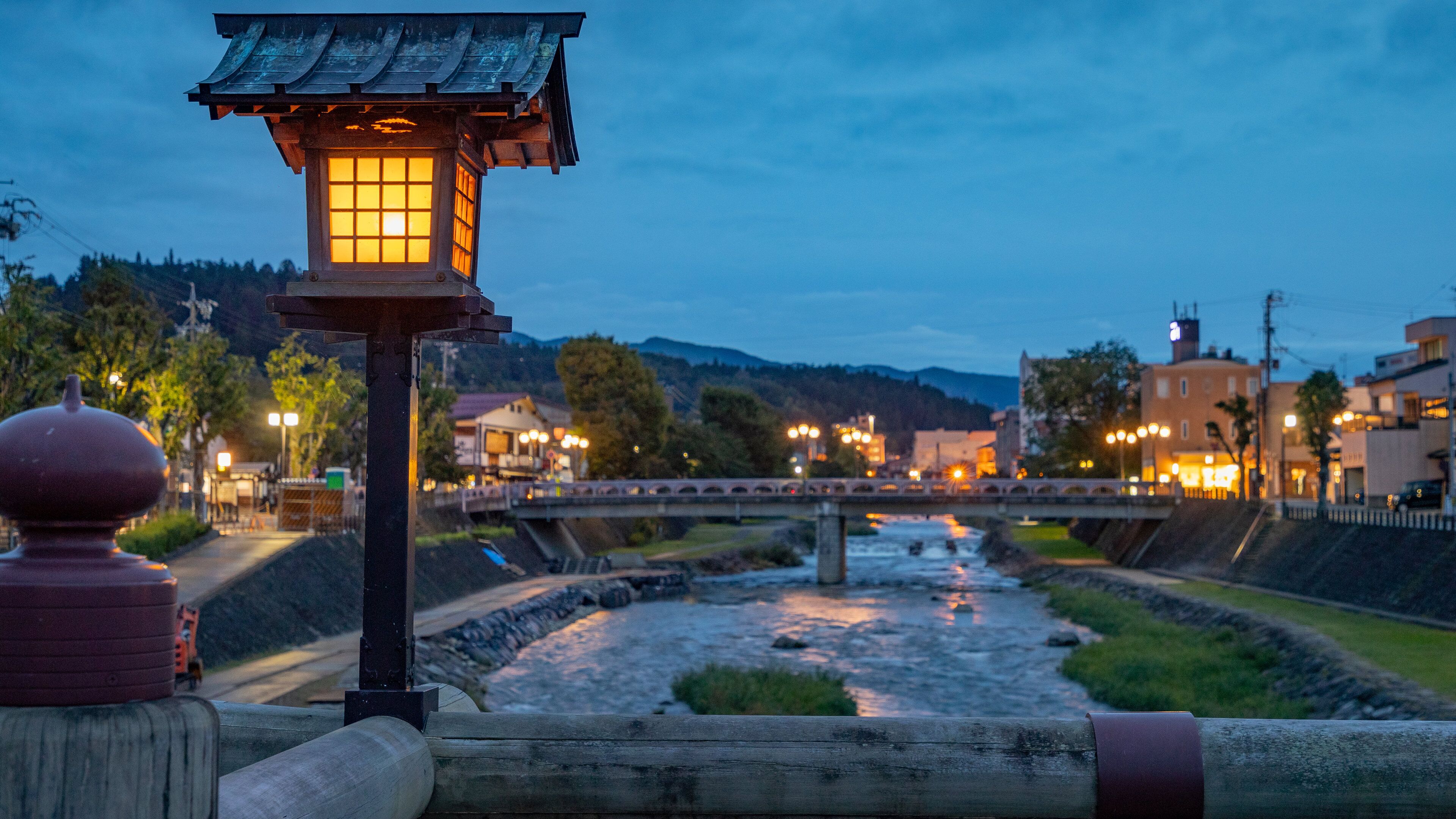 Takayama featuring a river or creek, a bridge and night scenes