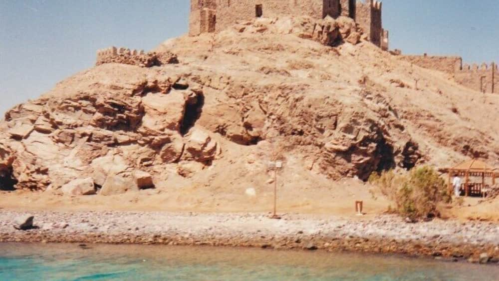 An imposing fortress built by Saleh el Din in 1170. This is an unedited print photo from 35mm film but the water is still a #colorful blue