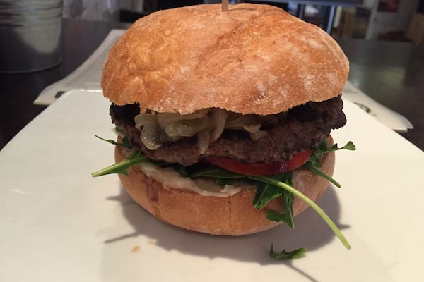 My first time trying a kangaroo burger. Served with caramelized onions, greens, tomatoes, and beetroot relish. Pretty good.