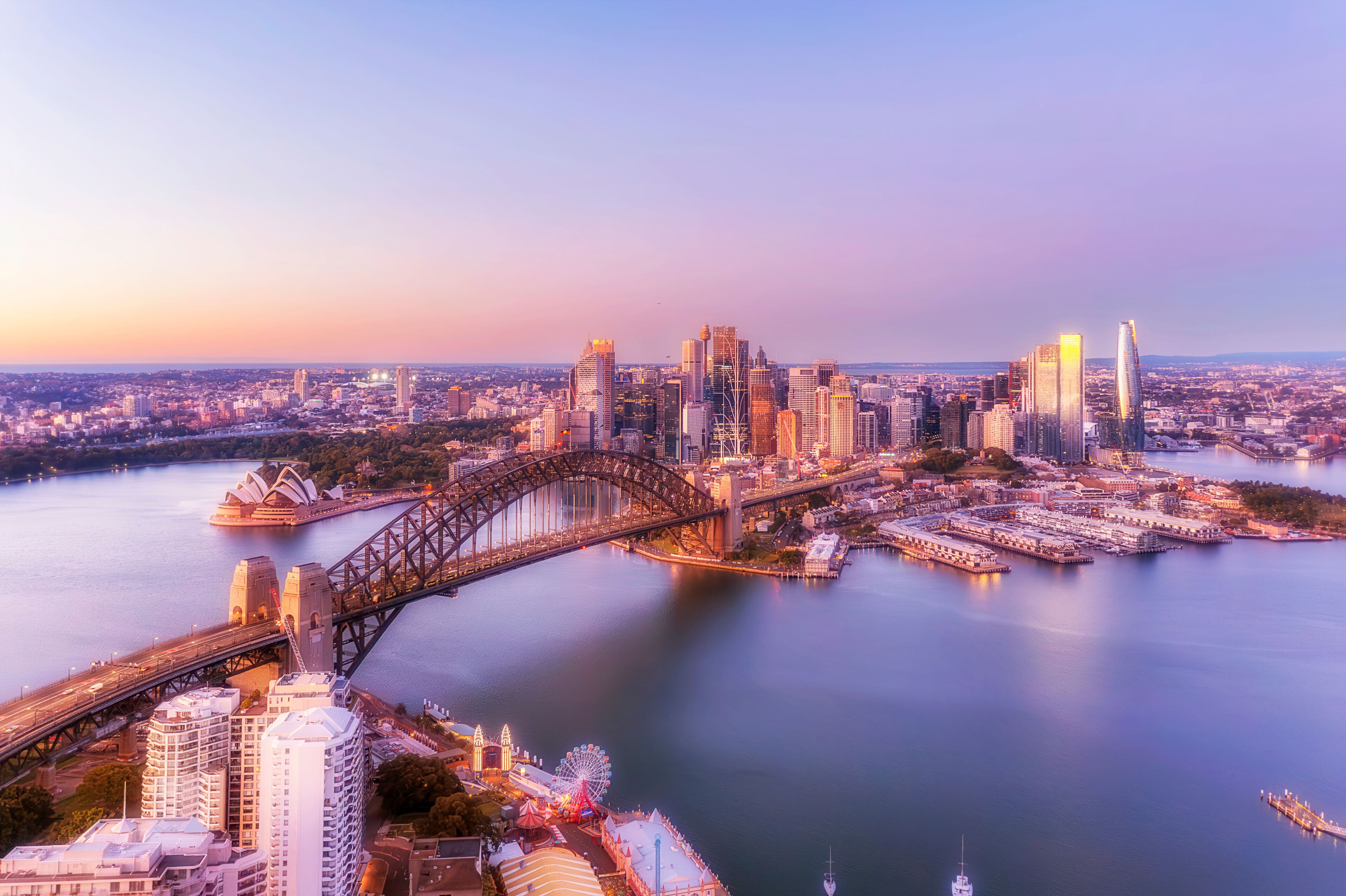 Sydney's skyline, the Sydney Opera House, and the Sydney Harbour Bridge.