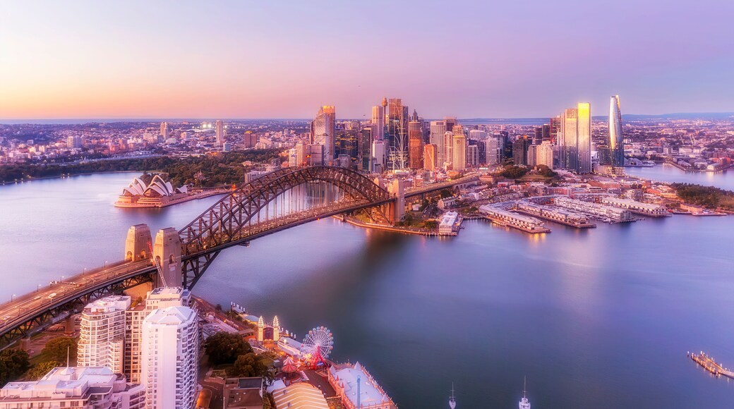 Sydney's skyline, the Sydney Opera House, and the Sydney Harbour Bridge.