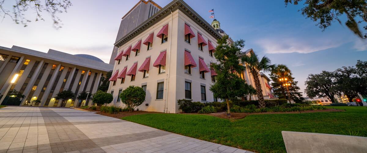 Florida State Capitol Building with trees in frame