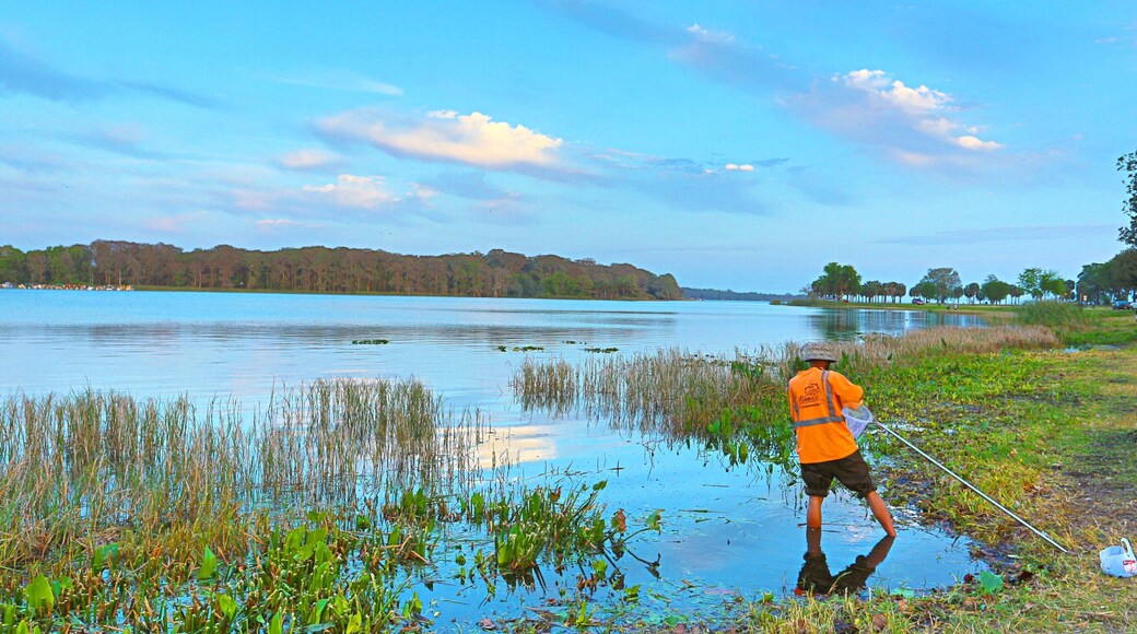 Leesburg showing a lake or waterhole and fishing as well as an individual male