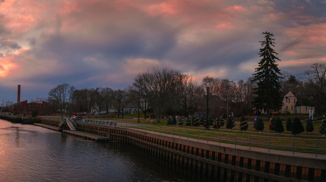 Dramatic cloudscape at sunrise over the coastal village and canal in Wareham, Massachusetts.