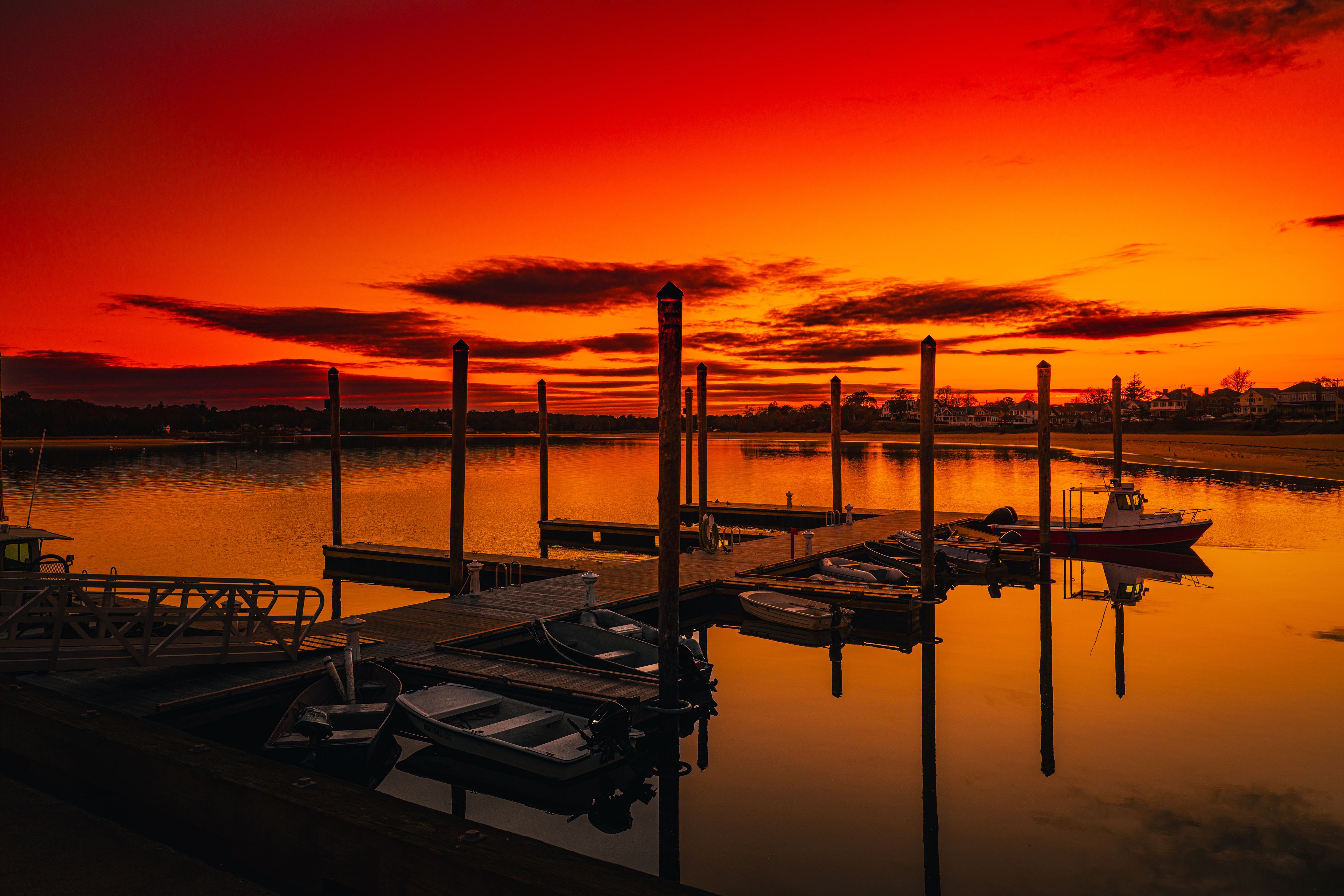 Sunset at Onset Beach with moored boats and ships in Wareham Harbor, Massachusetts, USA