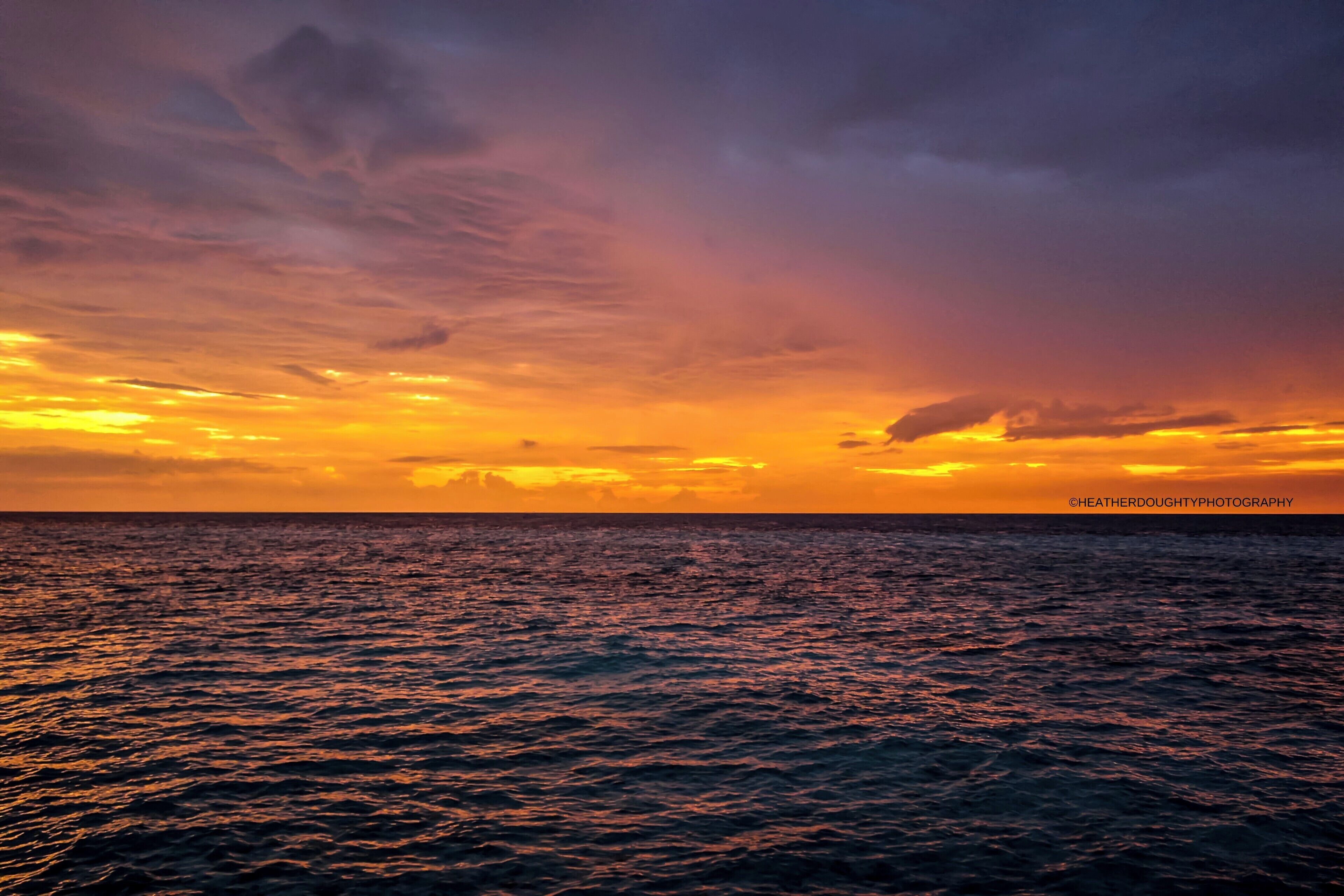 While honeymooning in the Maldives, we witnessed numerous sunsets as beautiful as the one the night before. This particular one had warm, moody colors and paired well with a glass of wine. 

https://goo.gl/mTTSVu
