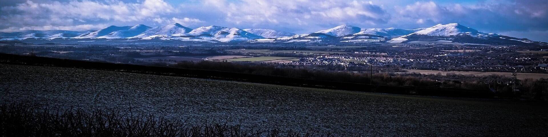 The Pentland Hills just recently with a dusting of snow. Although some access points to these hills are only a few minutes from the Edinburgh bypass it is possible to wander for a full day and feel you are miles from any city activity.