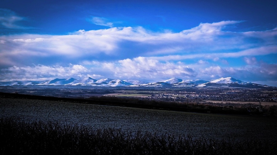 The Pentland Hills just recently with a dusting of snow. Although some access points to these hills are only a few minutes from the Edinburgh bypass it is possible to wander for a full day and feel you are miles from any city activity.