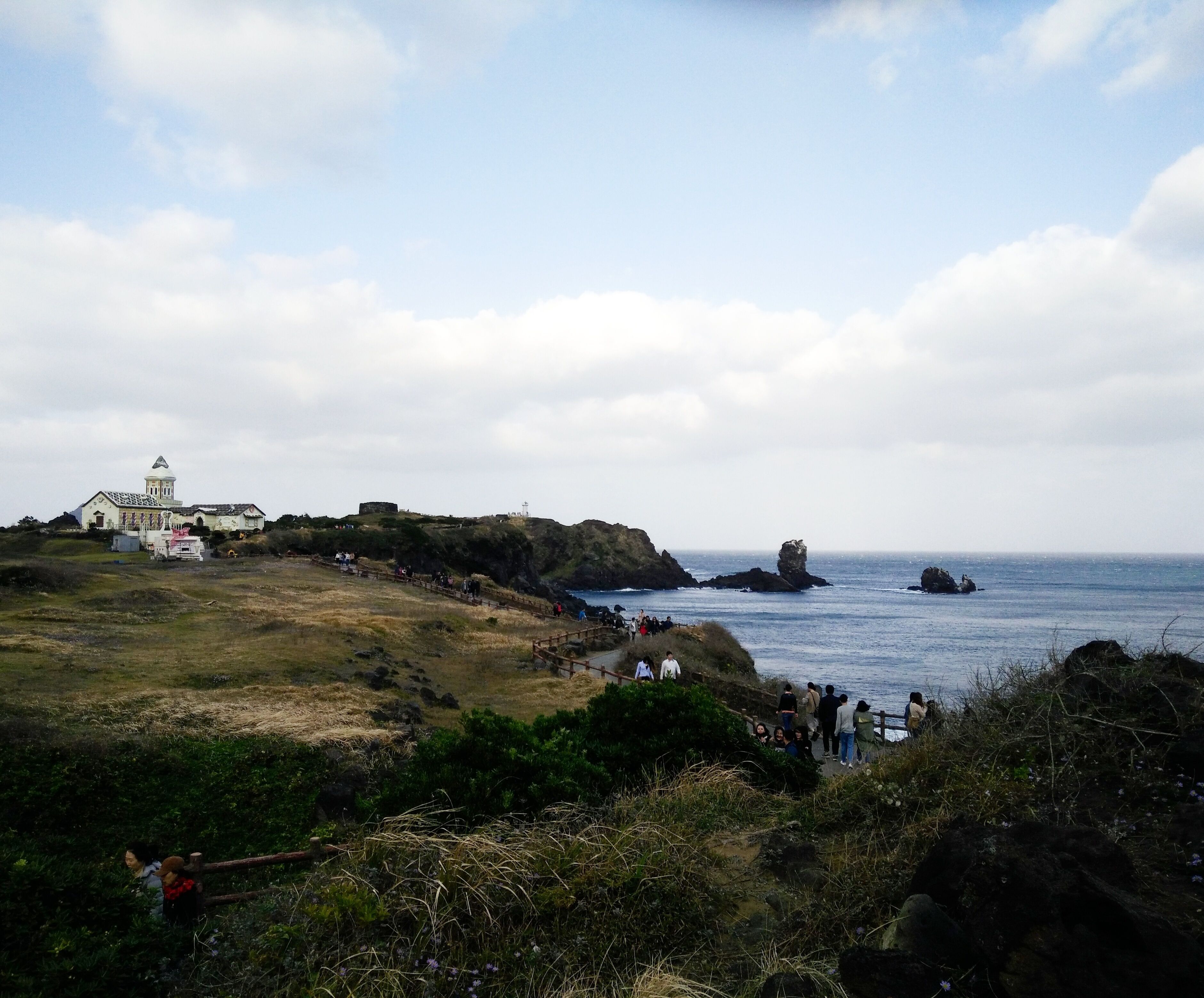 It was so windy at Seopjikoji Coast. The 3 things that Jeju Island is famous for, wind, rocks and women.