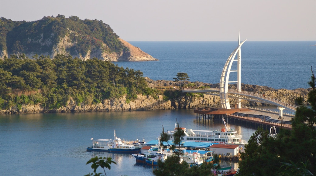 Seogwipo featuring a bridge, general coastal views and rocky coastline