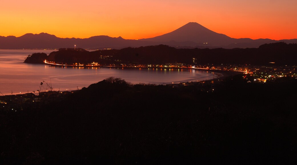 Kamakura featuring general coastal views, landscape views and a sunset