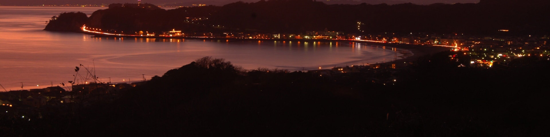 Kamakura featuring general coastal views, landscape views and a sunset