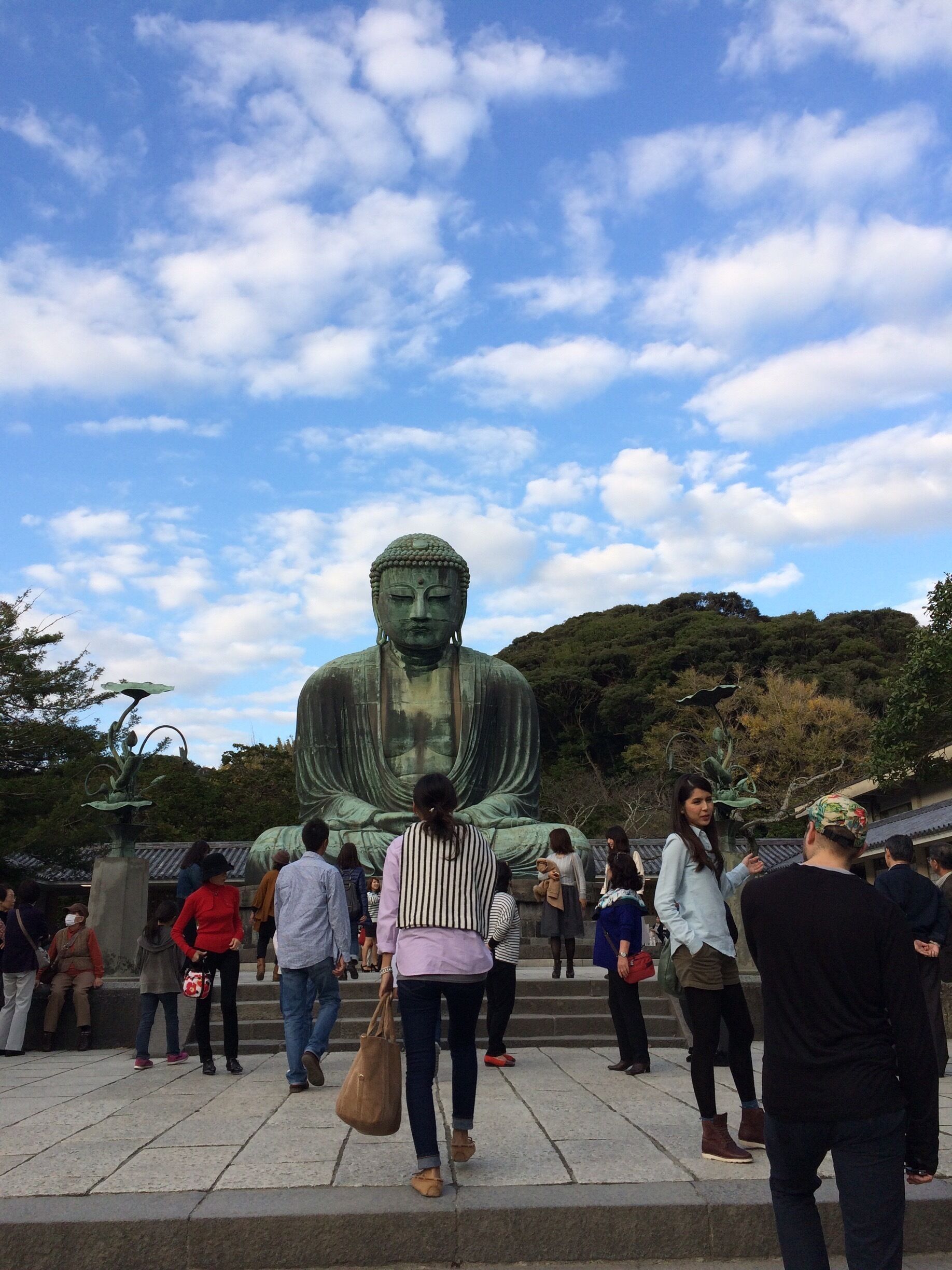 The Big Buddha or Daibutsu in Kamakura, which is a bit over an hour's drive from Tokyo, is a popular day trip from the city. Located in a nice park, the image sits elegantly outdoors. For 20 yen, you could also go inside it, which is unusual. The town of Kamakura itself is really lovely, with a terrific walking street full of cute shops in the evening.