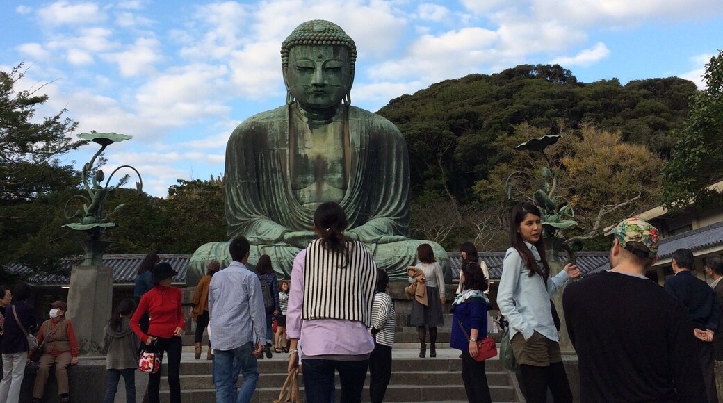 The Big Buddha or Daibutsu in Kamakura, which is a bit over an hour's drive from Tokyo, is a popular day trip from the city. Located in a nice park, the image sits elegantly outdoors. For 20 yen, you could also go inside it, which is unusual. The town of Kamakura itself is really lovely, with a terrific walking street full of cute shops in the evening.