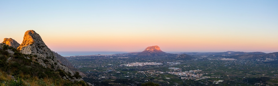 Panoramic view of Marina Alta valley view from Segaria mountain at sunset.