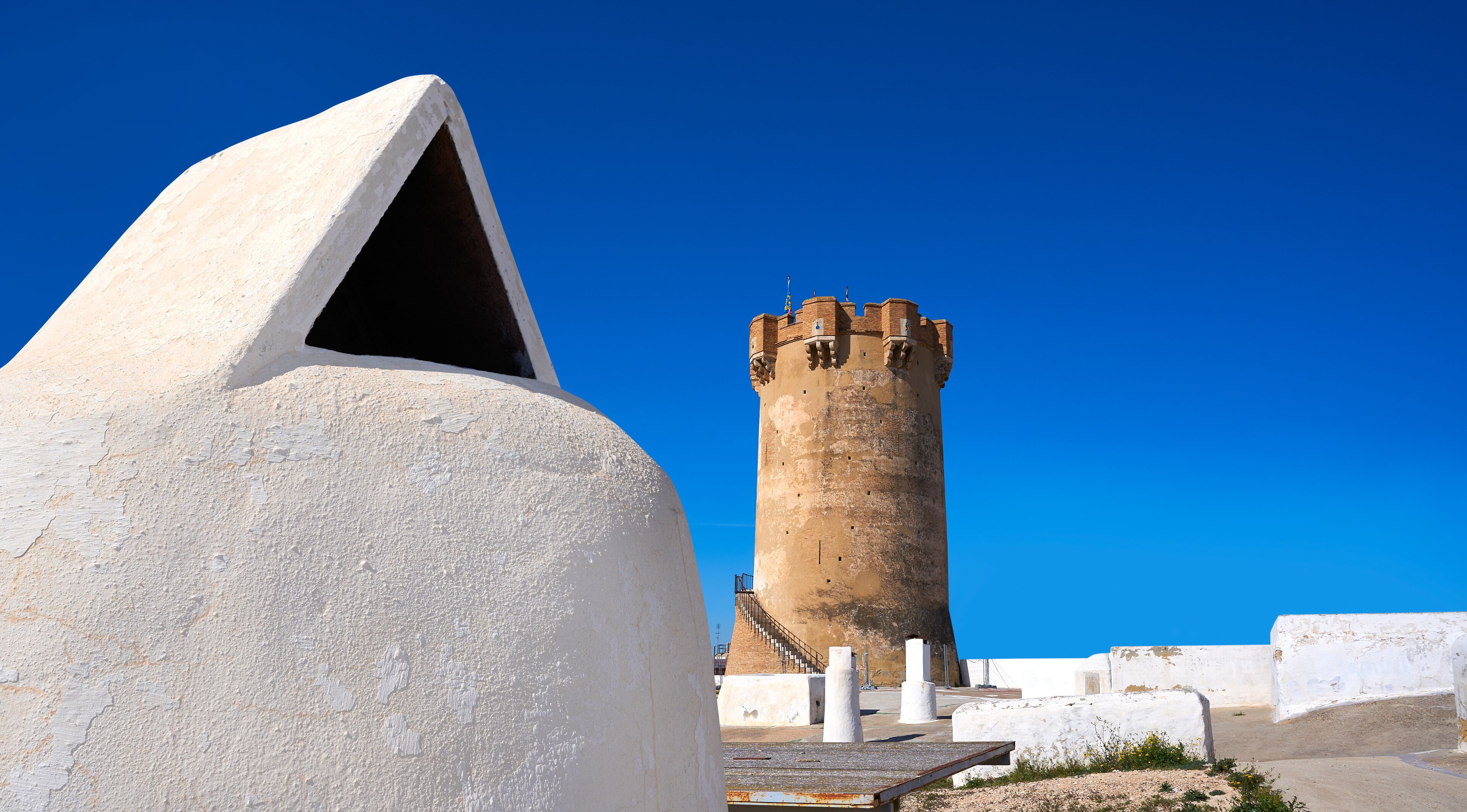 Paterna tower Valencia and chimneys of cave houses