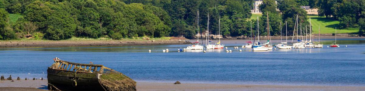Scenic Coastal View with Old Boat and Sailboats, Lanester-Kerhervy, Brittany