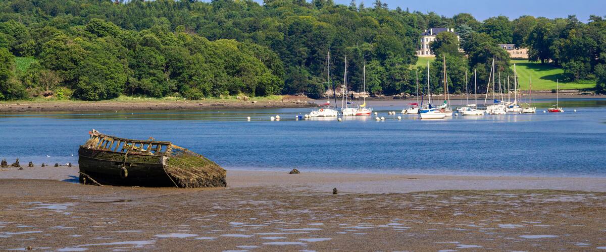 Scenic Coastal View with Old Boat and Sailboats, Lanester-Kerhervy, Brittany