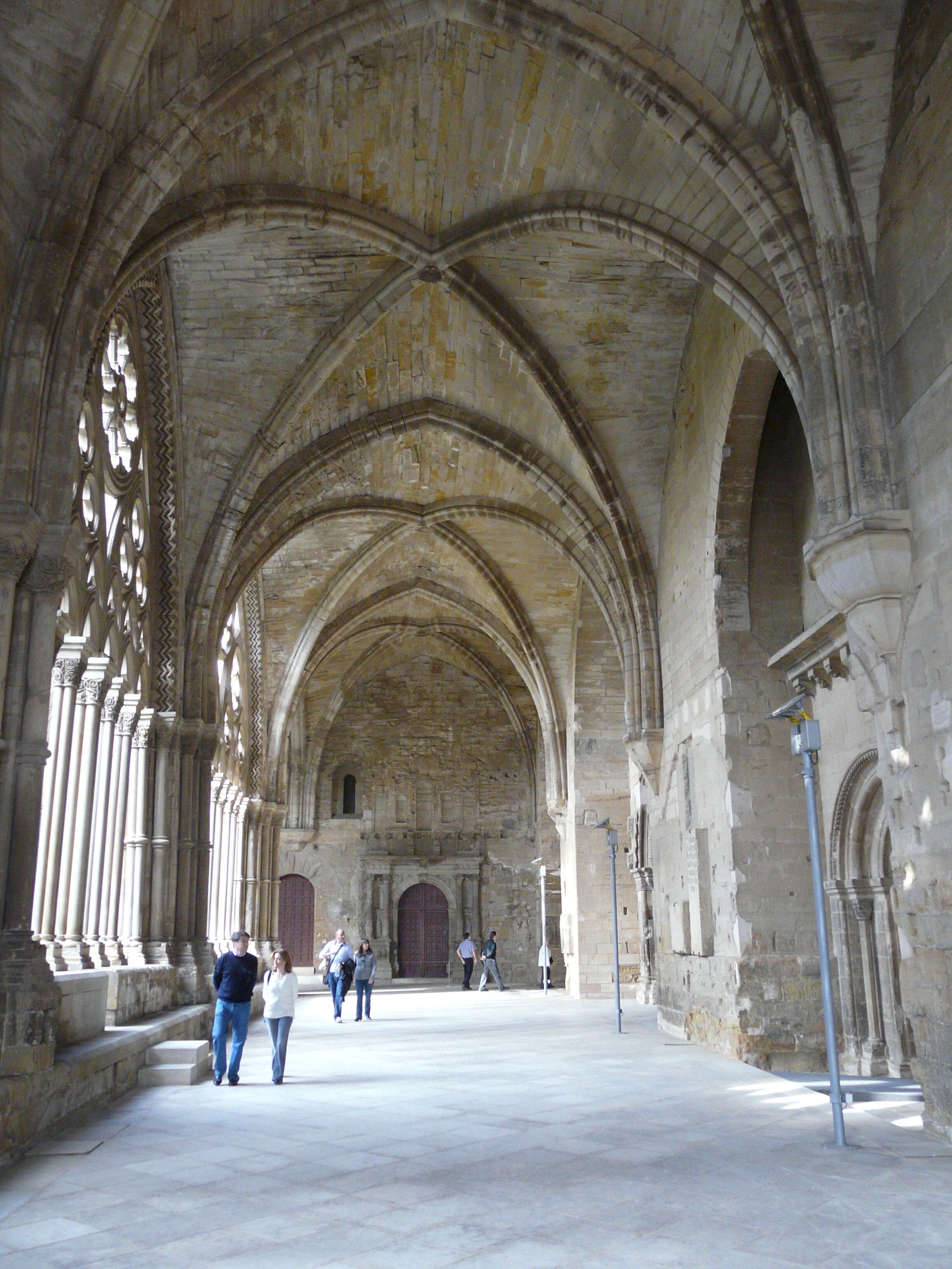 A cathedral interior with arched ceilings and columns.