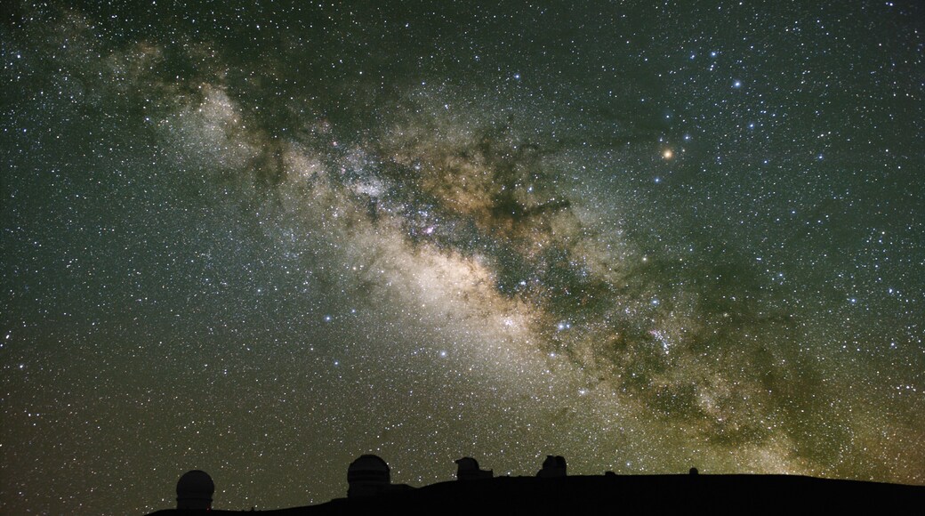 Telescopes observe the Milky Way. These are on Mauna Kea, Hawaii; one of the best astronomical sites in the world