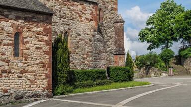 Bell tower of the church of Saint-Mayme in commune of Onet-le-Château, Aveyron, France