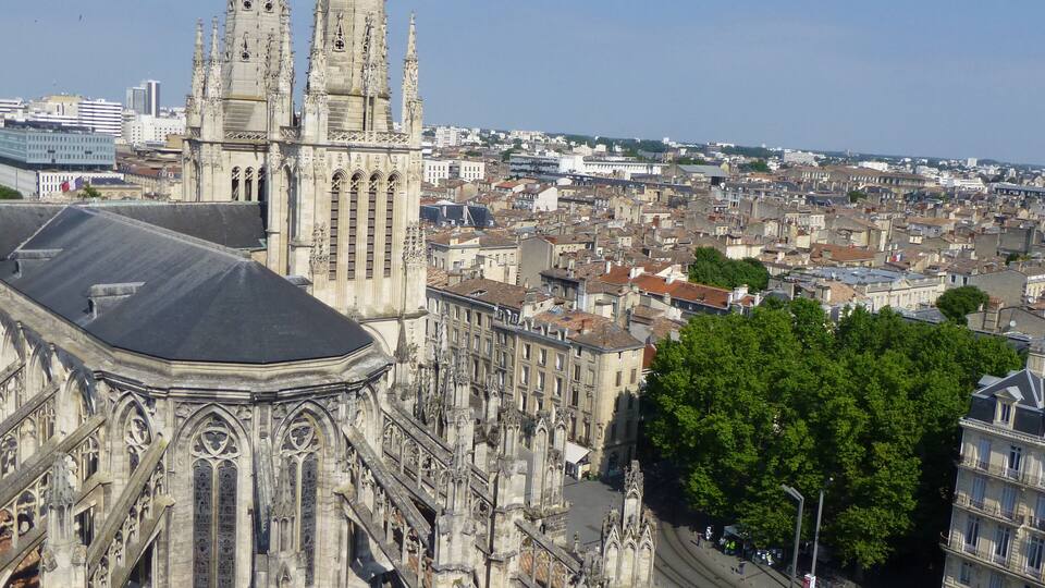 A cathedral with two tall spires and a large dome.