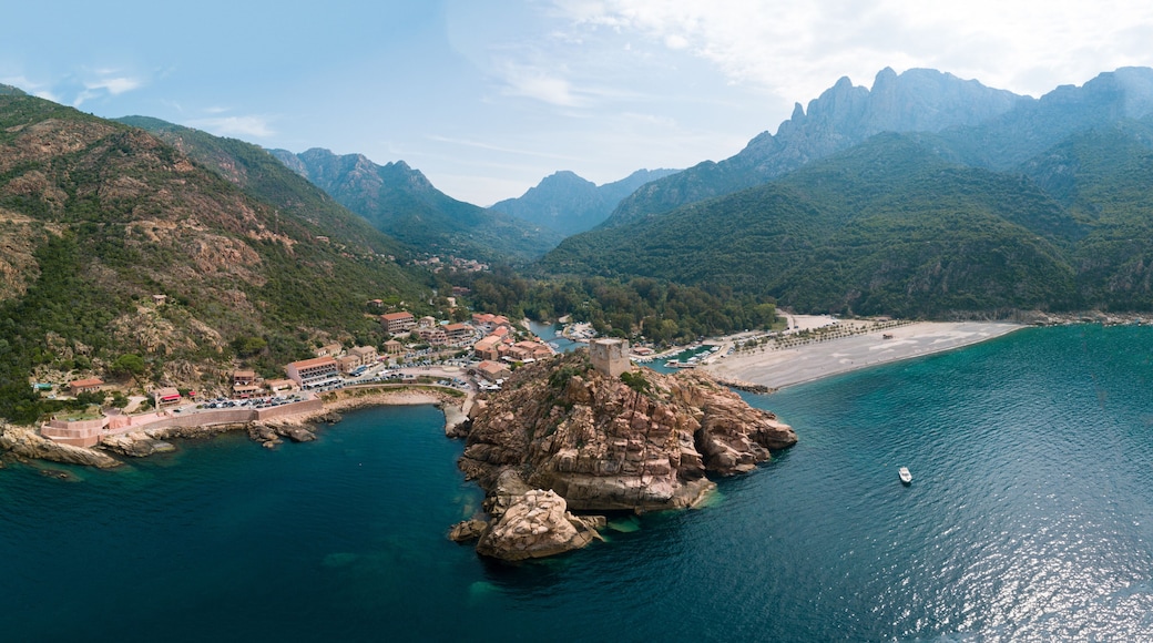 Drone photography of Calanches Piana and Porto ota city with rock cliffs and turquoise waters in Cap Corse