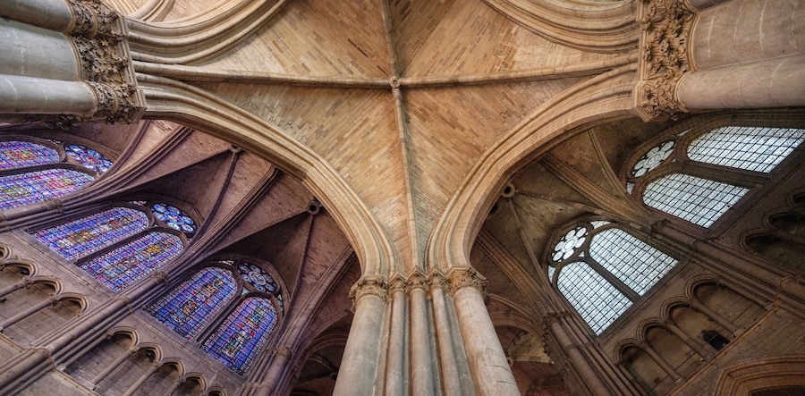 stained glass windows and ceiling of famous cathedral in french city of reims