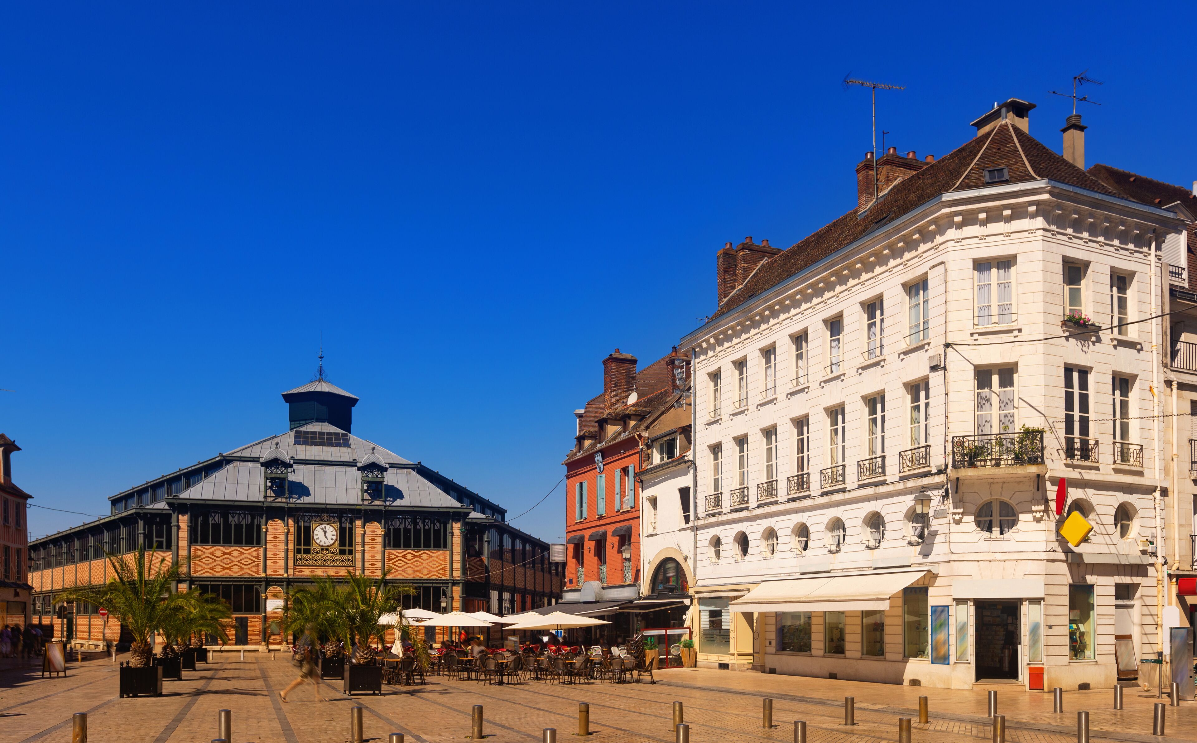 Peaceful streets of Sens, France. Buildings along walkway during daytime.