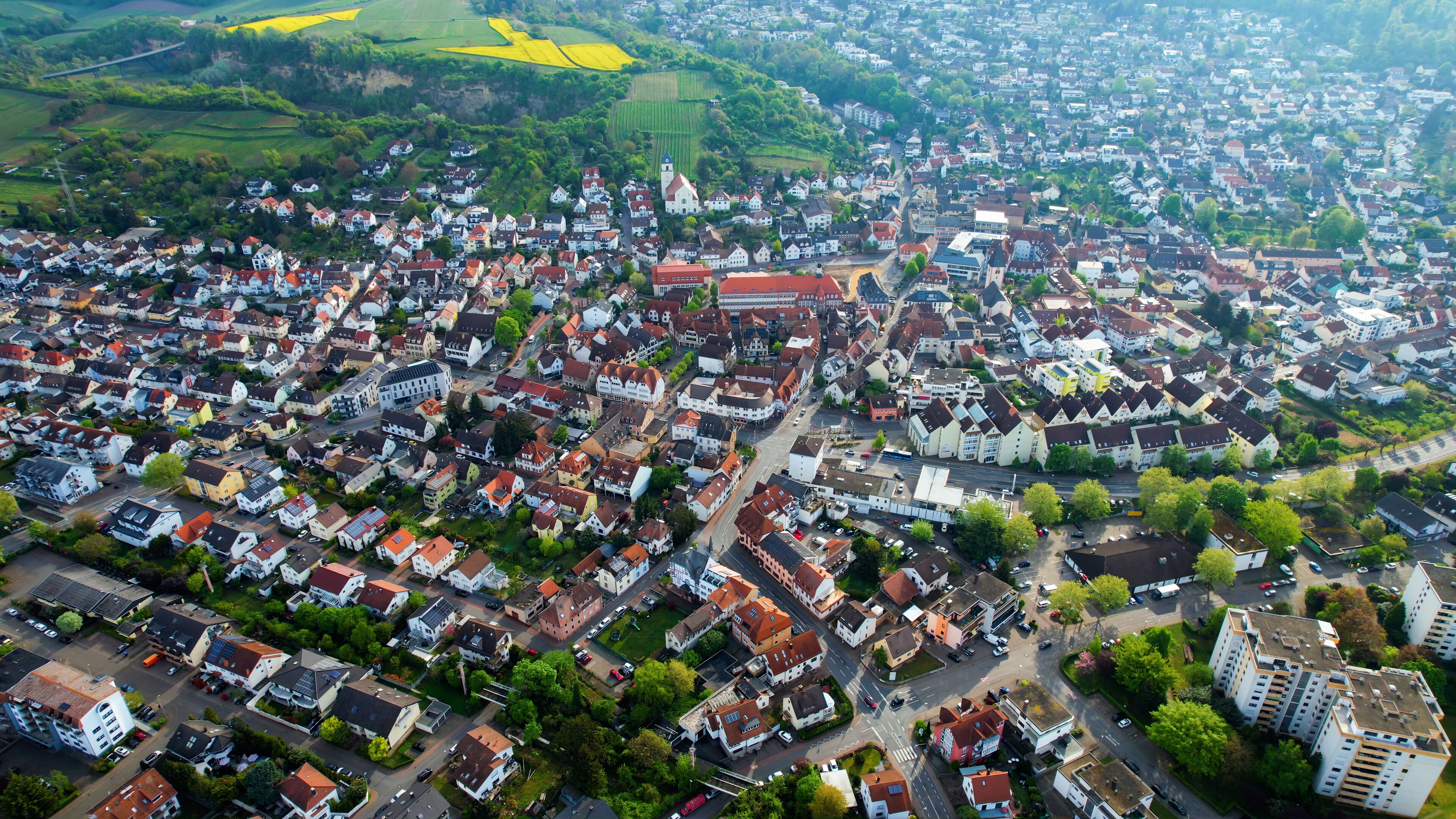 Aerial view around the old town of the city Leimen, Germany on a cloudy spring day