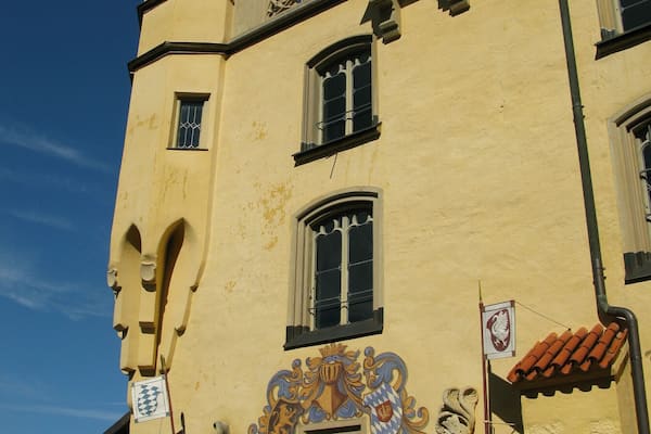 Hohenschwangau is the castle of the childhood of King Ludwig II of Bavaria who watched from a window here as his dream castle of Neuschwanstein was built. You can look at the same view from his telescope within.