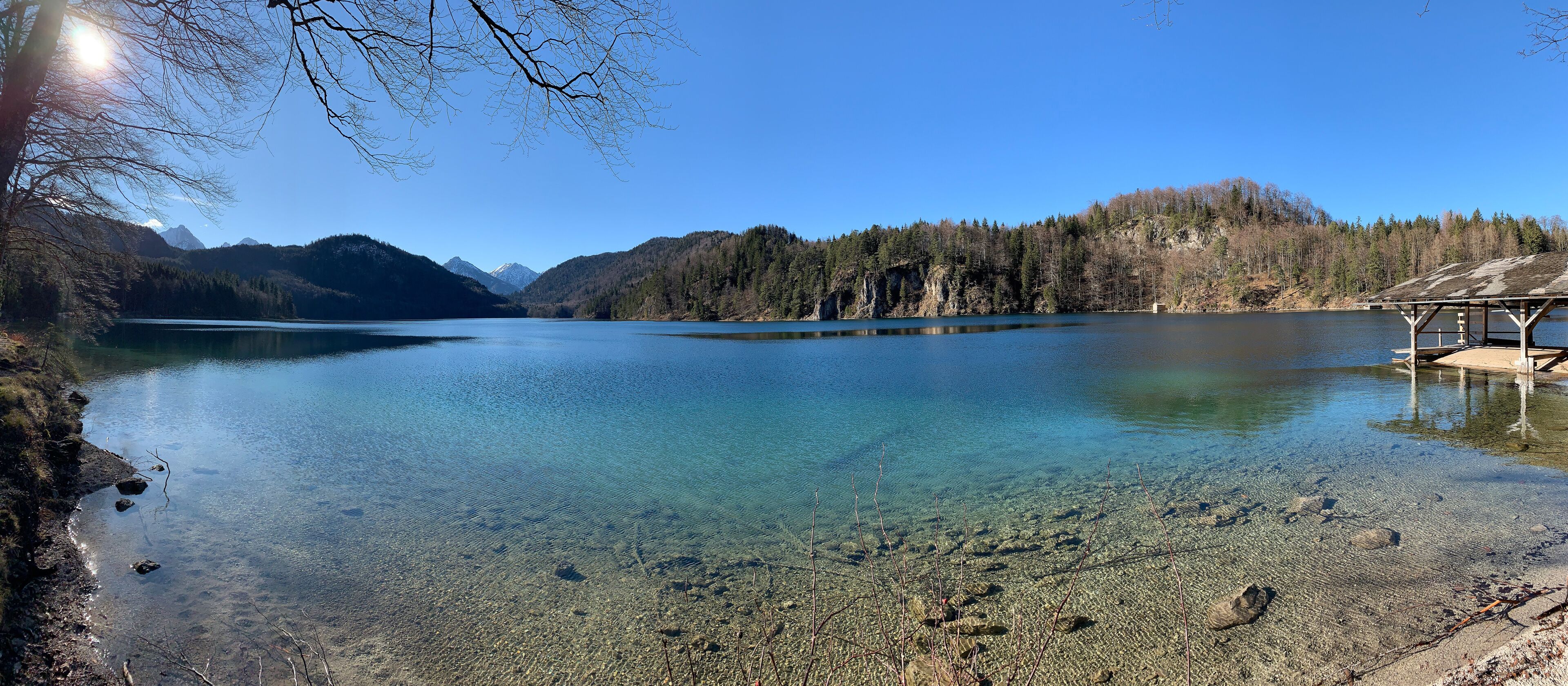 Panoramic view of the Alpsee lake on a sunny day near Neuschwanstein castle. Schwangau, Bavaria, Germany