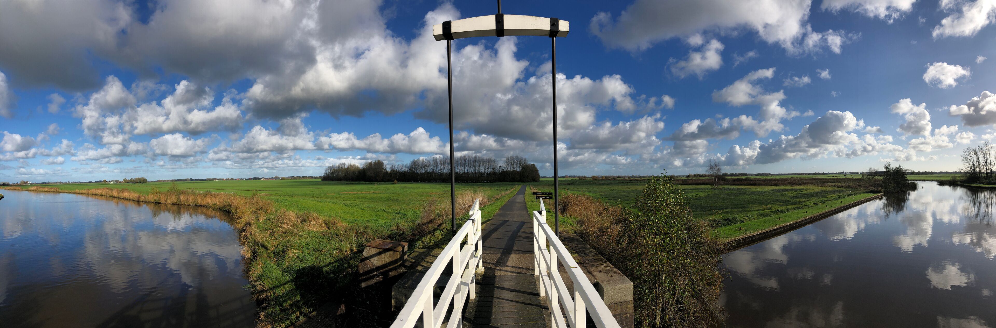Panoramic from a bridge over a canal in a nature reserve